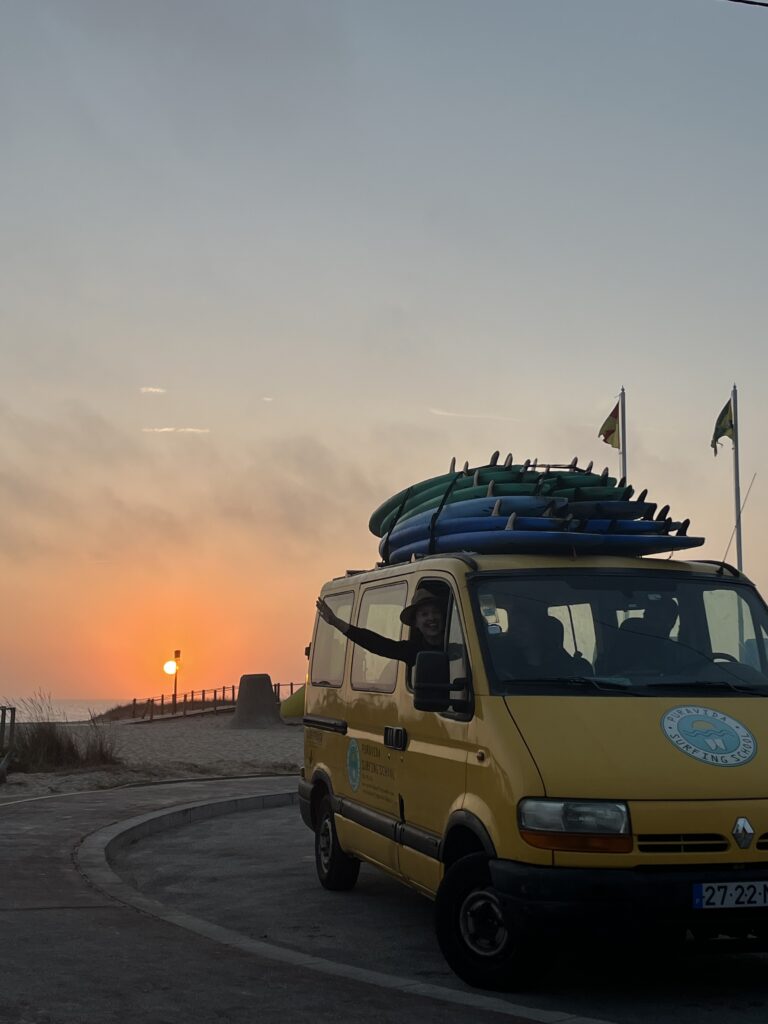 surf classes with transportation from porto to the beach
